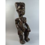 A Large Early 20th Century African Tribal Fertility/Reliquary Figure of Squatting Female.