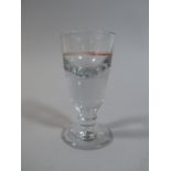 A 19th Century Toastmasters Illusion Glass.