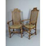 A Pair of Edwardian Cane Backed and Seated Scroll Arm Chairs.