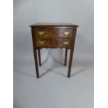 A Small 19th Century Two Drawer Side Table on Square Supports.