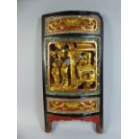 A Chinese Lacquered and Gilt Decorated Carved Wooden Panel, Formerly Part of an Opium Bed.