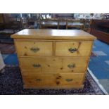 A Small Victorian Pine Chest of Two Short and Two Long Drawers,