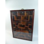 A Chinese Hardwood Wall Hanging Collectors Display Cabinet with Fitted Interior Behind Glazed Front.