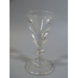 A 18th Century Toasting or Illusion Glass with Angular Knop