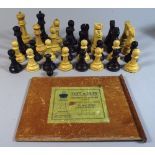 An Unusual Boxed Set of 1930s Chess Pieces.