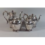 A Four Piece Sheffield Tea Service Comprising Sugar, Milk, Coffee and Tea Pots.