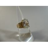 A 9ct Aquamarine Set Ladies Dress Ring. Stone 14x10mm. Total Weight 5.7gms.