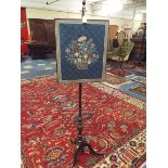 A Mid 19th Century Mahogany Pole Screen with Later Tapestry on Tripod Stand