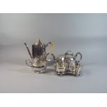 A Collection of Silver Plate to include Coffee Pot, Tea Pot, Sauce Boat and Sauce Cruet.