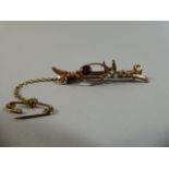 An Edwardian 9ct Rose Gold Ladies Brooch Mounted with Swallow, Set with Seed Pearls and Garnet. 2.