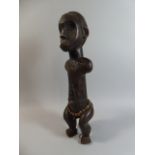An Early 20th Century Wooden Fang (Cameroon) Reliquary Figure with Metal Mounts,