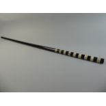 A 19th Century Walking Stick with Ebony Shaft and a Handle Made with Alternate Bands of Black and