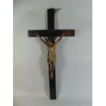 A 19th Century Ebonised Wooden Crucifix with Polychrome Painted Plaster Corpus Christi,