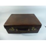 An Early 20th Century Brown Leather Suitcase,