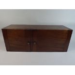 An Early 19th Century Mahogany Campaign Cupboard with Two Drawers Flanked by Two Brass Carrying