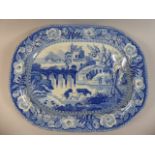 A 19th Century Staffordshire Blue and White Meat Plate Decorated with Ruins and Cattle in River. 51.