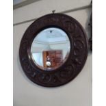 A Late 19th Century Circular Blind Carved Mahogany Framed Mirror with Bevelled Glass.