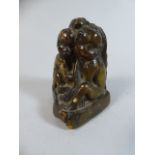An Oriental Incense Stick Holder Carved as a Soapstone Study of Female Monkey and Young, 8cm High.