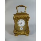 A Small 19th Century Brass French Carriage Clock with Repeater Movement Chiming on a Gong.
