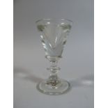 An 18th Century Toasting or Illusion Glass with Angular Knop