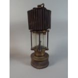 A Brass Mounted Miners Lamp by Patterson Lamp Ltd with Corrugated Cowl,