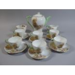 A Shelley Coffee Pot Set, 'Heather' Pattern Comprising Six Cups and Saucers, Coffee Pot,