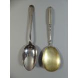 An Indonesian White Metal Serving Spoon having National Eagle Crest 'Bhineka Tunggal Ika' and a