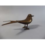 A Late 19th Century Eastern European Iron Long Tailed Bird Ornament with Gilt Decoration. 17cm Wide.