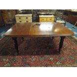 A Late Victorian Wind Out Mahogany Dining Table with One Extra Leaf,