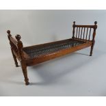 A Late 19th Century Salesman's Sample of a Folding Campaign Bed Complete with Wire Work Base,