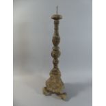 A 19th Century Italian Carved Wood Pricket Candle Stick with Original Painted Finish.