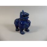 An Oriental Blue Glazed Earthenware Censer in the Form of a Mythical Horned Beast (head glued to