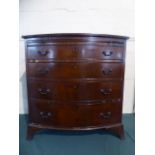 A Small Bow Fronted Mahogany Chest of Four Graduated Long Drawers with Brushing Slide Over.