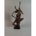 A Modern Art Cast Metal Bronze Effect Study of Musician Playing Double Bass,