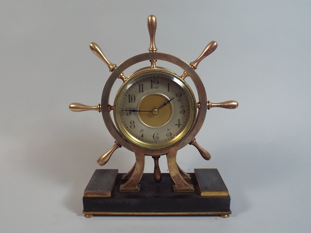 A French Industrial Mantel Clock in the Form of a Bronze Ships Wheel with Black Marble Plinth,