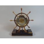 A French Industrial Mantel Clock in the Form of a Bronze Ships Wheel with Black Marble Plinth,