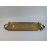 A Rectangular Brass Tray with Engraved Islamic Floriate Decoration,