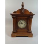 A German Pine Cased Mantel Clock,