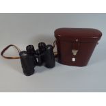 A Pair of Leather Cased Carl Zeiss Jena Jenoptem 10x50 Binoculars