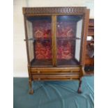 An Edwardian Carved Oak Display Cabinet with Two Display Doors Under,