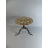 An Early 19th Century Steel and Brass Tripod Kettle Stand with Pierced Top,