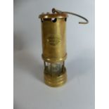 A Brass Miners Safety Lamp by The Lamp and Lighting Company