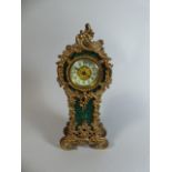 An Edwardian Faux Malachite and Ormolu Mantle Cock by the British United Clock Company,