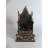 A Child's Oxidised Metal Money Box in the Form of the Coronation Throne, Dated 1953,