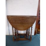 An Oak Barley Twist Drop Leaf Gate Leg Occasional Table,