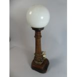 An Interesting Turned and Carved Oak Table Lamp in the Form of a Light House with Globe Shade,