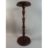 A Turned Oak Jardiniere Stand with Circular Top,