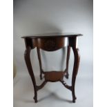 An Edwardian Mahogany Shaped Top Occasional Table with Shell Carving,