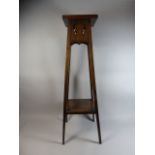 A Late Victorian/Edwardian Oak Jardiniere Stand with Stretcher Shelf,