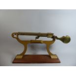 A Set of Late Victorian Brass Power Scales, 144 to 1 On Mahogany Plinth,